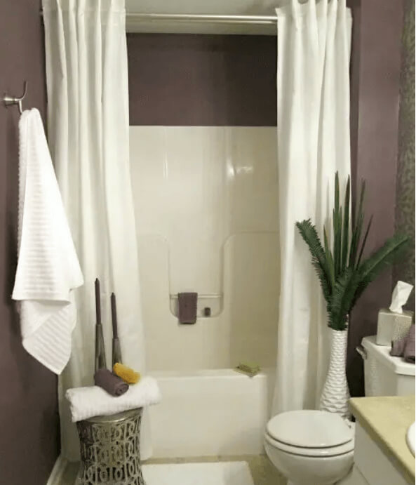 Create A Dramatic Look To Your Bathroom By Doubling Up On Your Shower Curtains