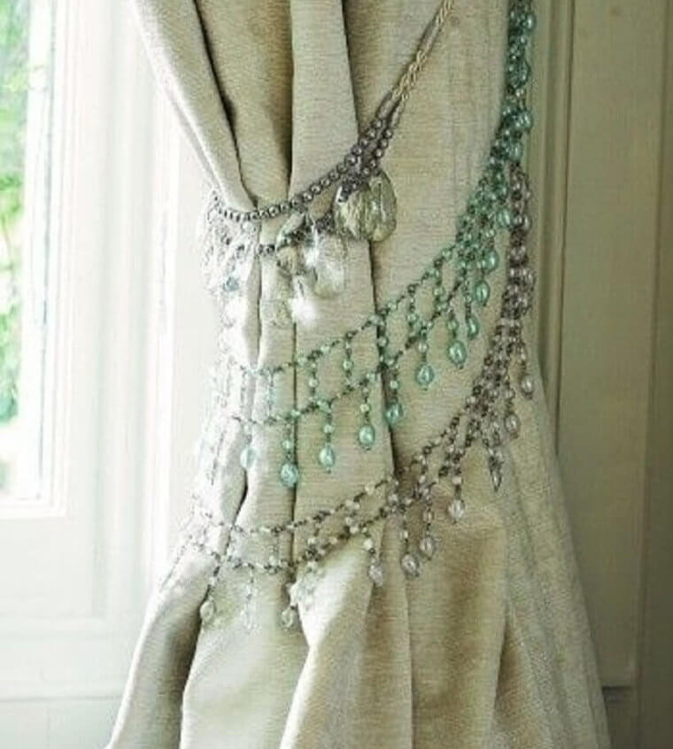 Use An Old Necklace As  Curtain Tiebacks